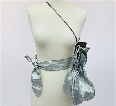 Lot 3081 - A 1980s silver leather and bronze leather...
