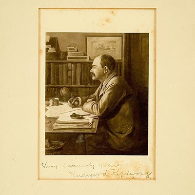 Lot 32 - A portrait of Rudyard Kipling with inscription.