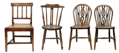 Lot 137 - A pair of beech, ash and elm wheelback chairs.