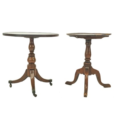 Lot 378 - A late George III mahogany circular tripod table.