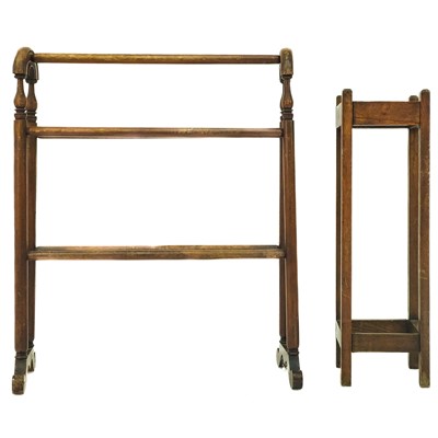 Lot 373 - An Arts and Crafts oak stick stand.