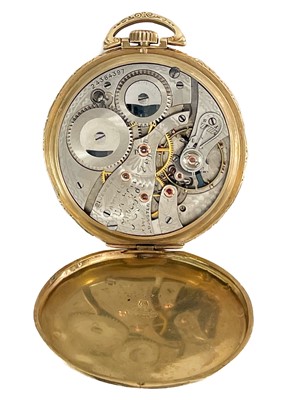 Lot 35 - A Waltham 14ct gold cased Art Deco slim dress crown wind pocket watch.