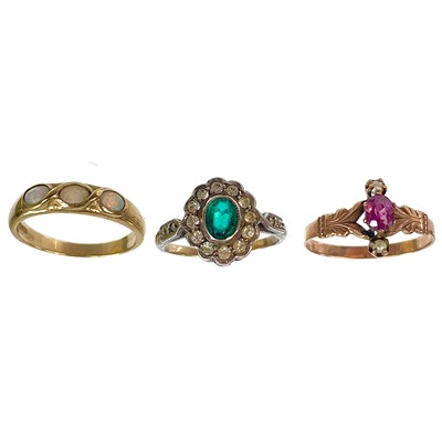 Lot 465 - Three gold stone set rings.