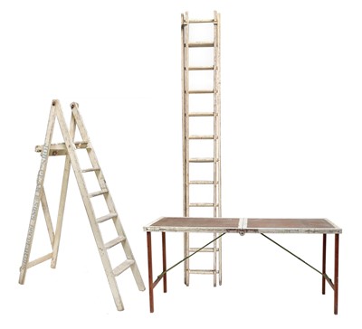 Lot 269 - Penzance interest, a set of step ladders, an extending ladder and a pasting table.