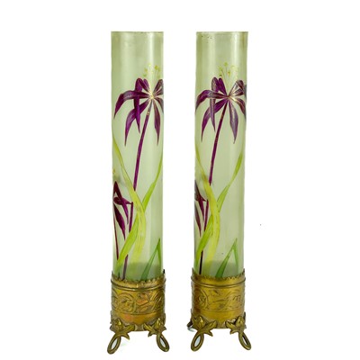 Lot 21 - A pair of French Art Nouveau brass and glass vases.