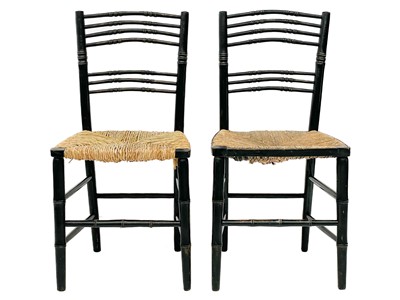 Lot 369 - A pair of Arts and Crafts ebonised faux bamboo chairs.