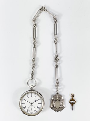 Lot 29 - A Swiss 935 silver cased key wind lever pocket watch with Albert watch chain and fob.