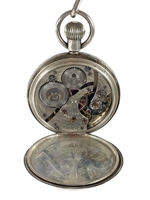 Lot 30 - A Waltham silver cased crown wind pocket watch with Albert watch chain and fob.