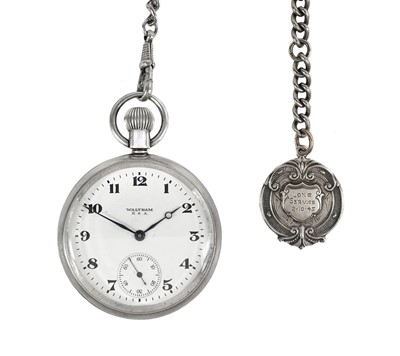 Lot 30 - A Waltham silver cased crown wind pocket watch with Albert watch chain and fob.