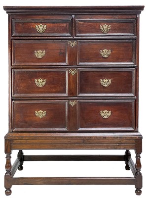 Lot 155 - An 18th century oak chest of drawers on a stand.