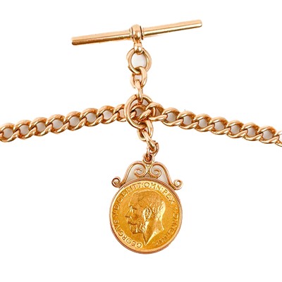 Lot 100 - A good 9ct hallmarked rose gold double Albert watch chain with 1912 full sovereign coin fob.