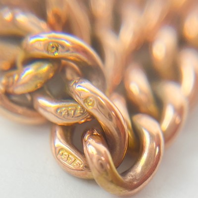 Lot 93 - A 9ct rose gold graduated curb link Albert watch chain.