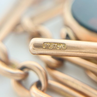 Lot 101 - A 9ct rose gold double Albert watch chain with 9ct swivel fob.