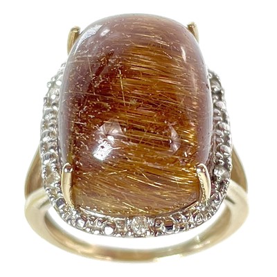 Lot 468 - A 9ct rutilated quartz and diamond set ring by Coloured Rocks.