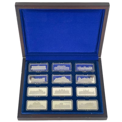 Lot 98 - A cased set of twelve commemorative silver-proof ingots.