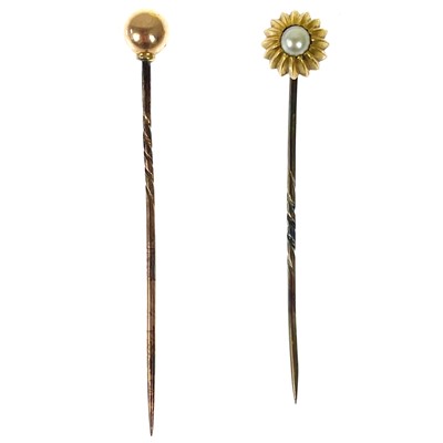 Lot 475 - Two gold stick pins.