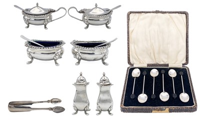 Lot 141 - A pair of William IV Scottish silver tongs with scallop bowls, maker T.K.