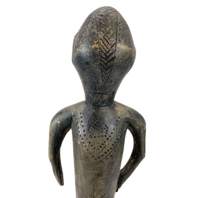 Lot 75 - An African carved tribal female fertility figure.