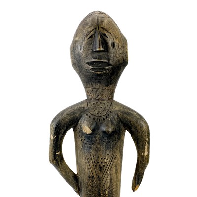 Lot 75 - An African carved tribal female fertility figure.