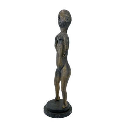 Lot 75 - An African carved tribal female fertility figure.