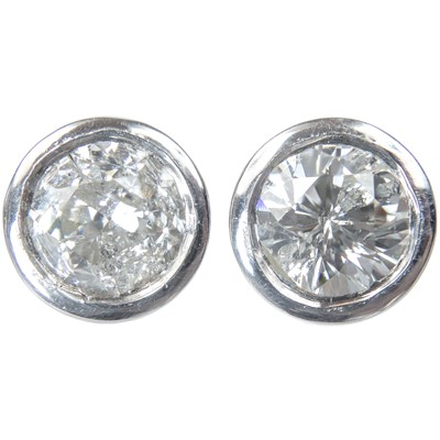 Lot 480 - A pair of 9ct white gold diamond set stud earrings, each is 1ct approximately.