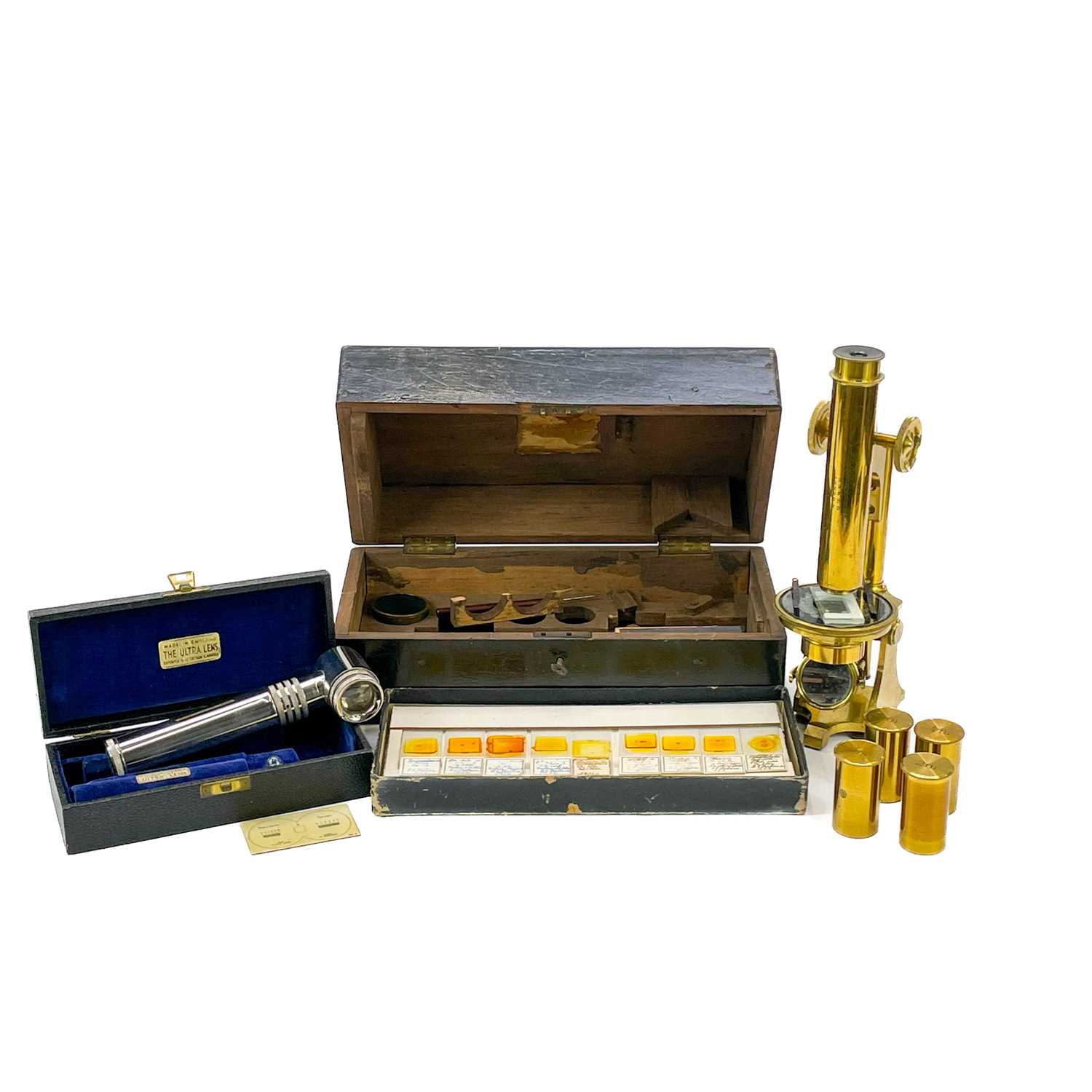 Lot 11 - A late Victorian brass travelling microscope marked Baker London.