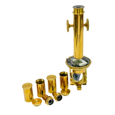 Lot 11 - A late Victorian brass travelling microscope marked Baker London.