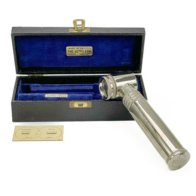 Lot 11 - A late Victorian brass travelling microscope marked Baker London.
