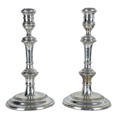 Lot 109 - A pair of modern silver candlesticks by William Comyns & Sons Ltd.