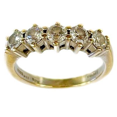 Lot 212 - A modern 18ct diamond set five stone ring.