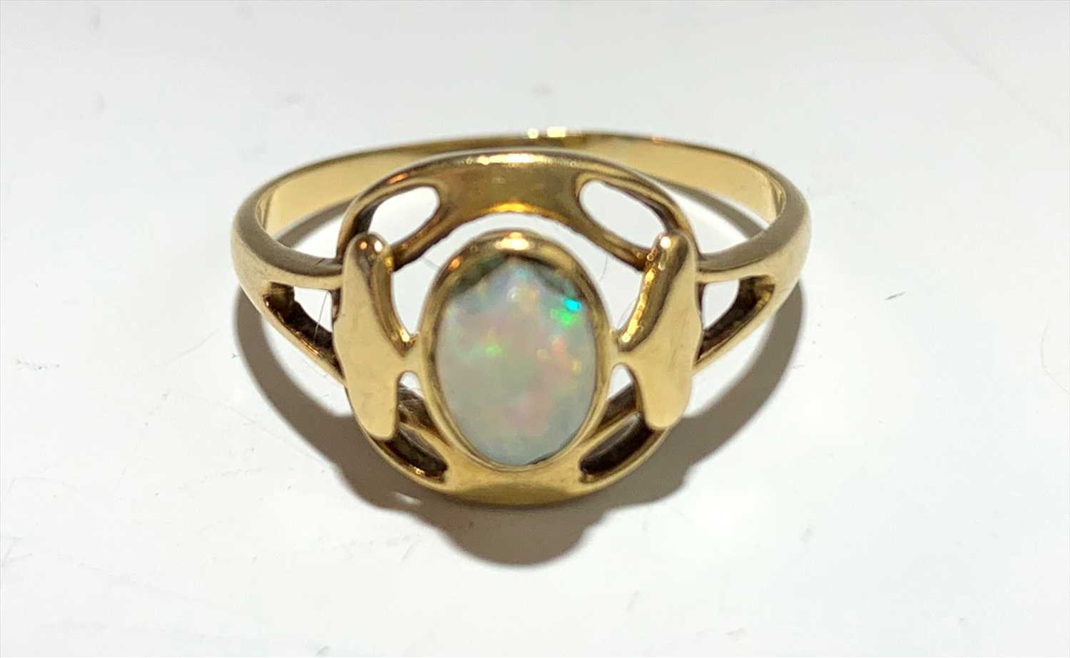Lot 2550 - An 18ct gold Murrle Bennett opal set ring in...