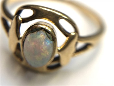 Lot 2550 - An 18ct gold Murrle Bennett opal set ring in...