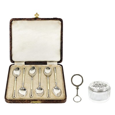 Lot 158 - A modern silver cased set of six enameled demitasse spoons by Turner & Simpson.