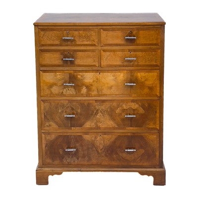 Lot 444 - A walnut tall chest of drawers.