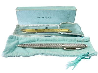 Lot 551 - A Tiffany & Co sterling silver roller ball pen.