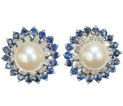 Lot 471 - A pair of 18ct white gold diamond, pearl and blue sapphire cluster earrings.