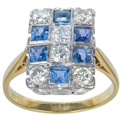 Lot 467 - An Art Deco 18ct diamond and cornflower blue sapphire panel ring.