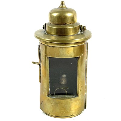 Lot 249 - A small brass nautical lamp.