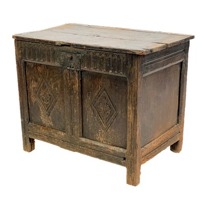 Lot 194 - A small panel oak coffer.
