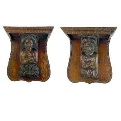 Lot 9 - Two oak misericord or brackets.