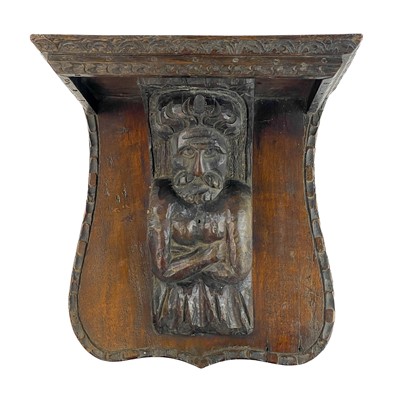 Lot 9 - Two oak misericord or brackets.