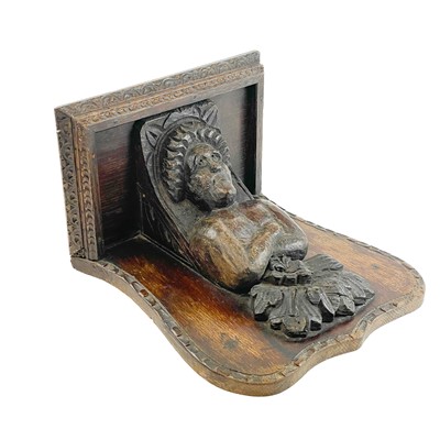 Lot 9 - Two oak misericord or brackets.