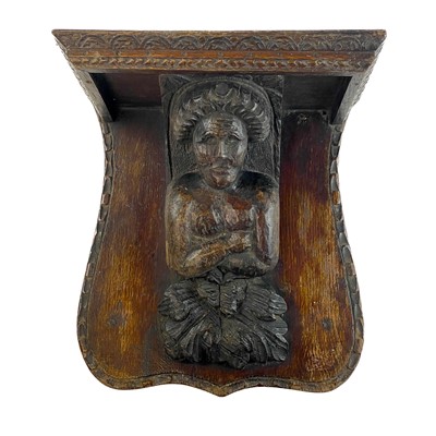 Lot 9 - Two oak misericord or brackets.