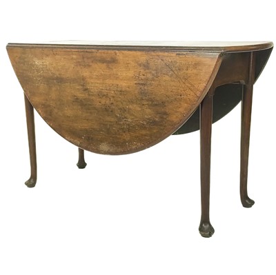 Lot 648 - A Georgian mahogany drop leaf table.