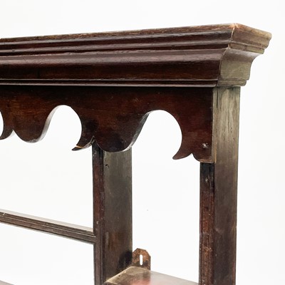 Lot 234 - An oak delft rack.