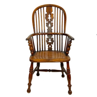 Lot 37 - A yew and ash Windsor armchair.