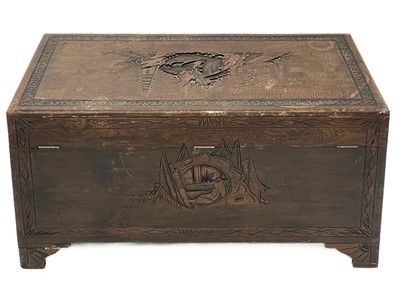 Lot 414 - A Chinese carved camphor wood chest.