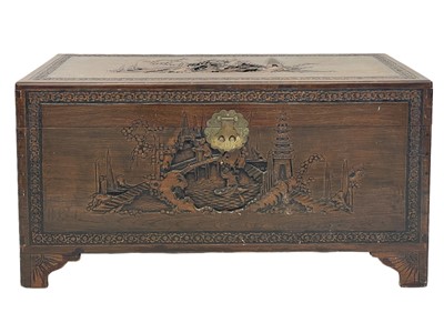 Lot 414 - A Chinese carved camphor wood chest.