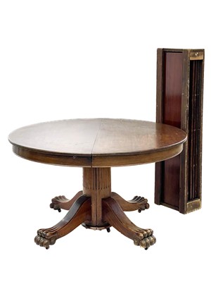 Lot 433 - A mahogany extending dining table.