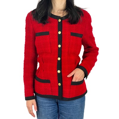 Lot 26 - A Chanel 1980's red boucle jacket with gold plated buttons and black trim.
